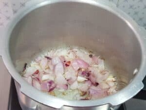 onion is sauteed in a pressure cooker