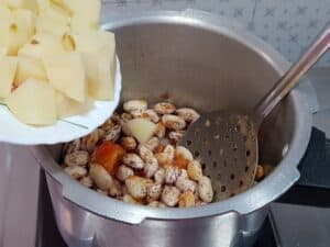 add rajma(kidney bean) and chopped potatoes