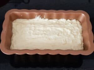 Grease a loaf pan and transfer the cake batter and bake in a preheat oven for 30 to 35 minutes at 180*C.