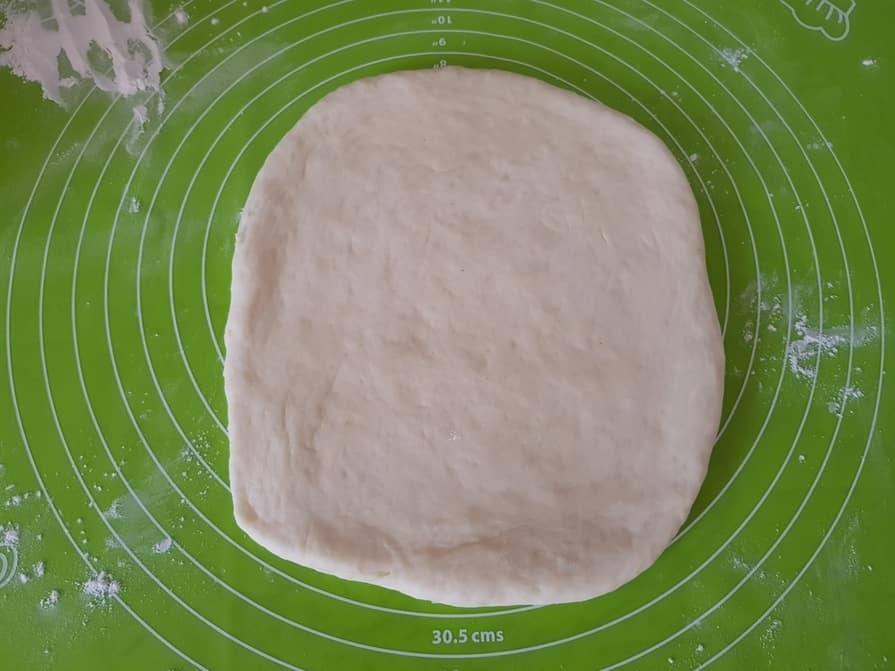 after 15 minutes, roll the dough to rectangle shape.