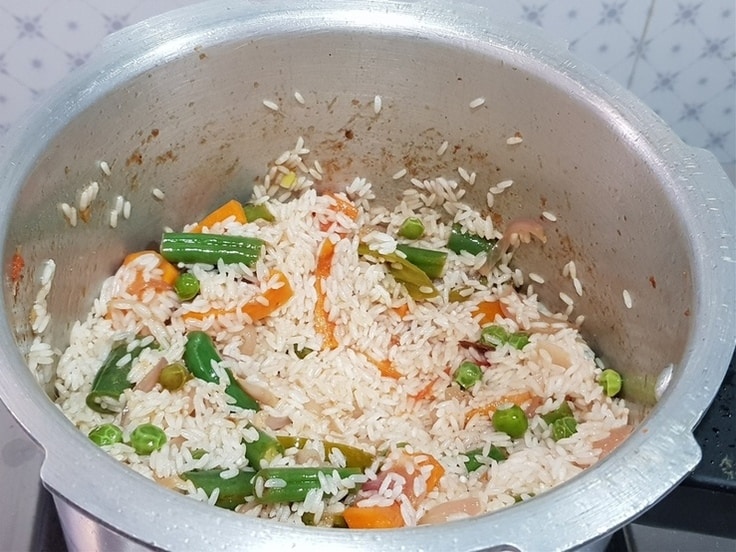 Gently mix the rice