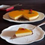 No-bake mango cheesecake slice on a plate.
