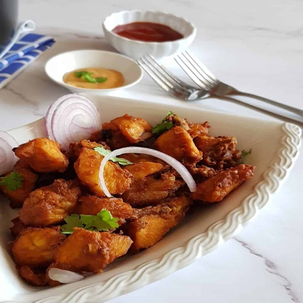 succulent chicken 65 served on a serving dish