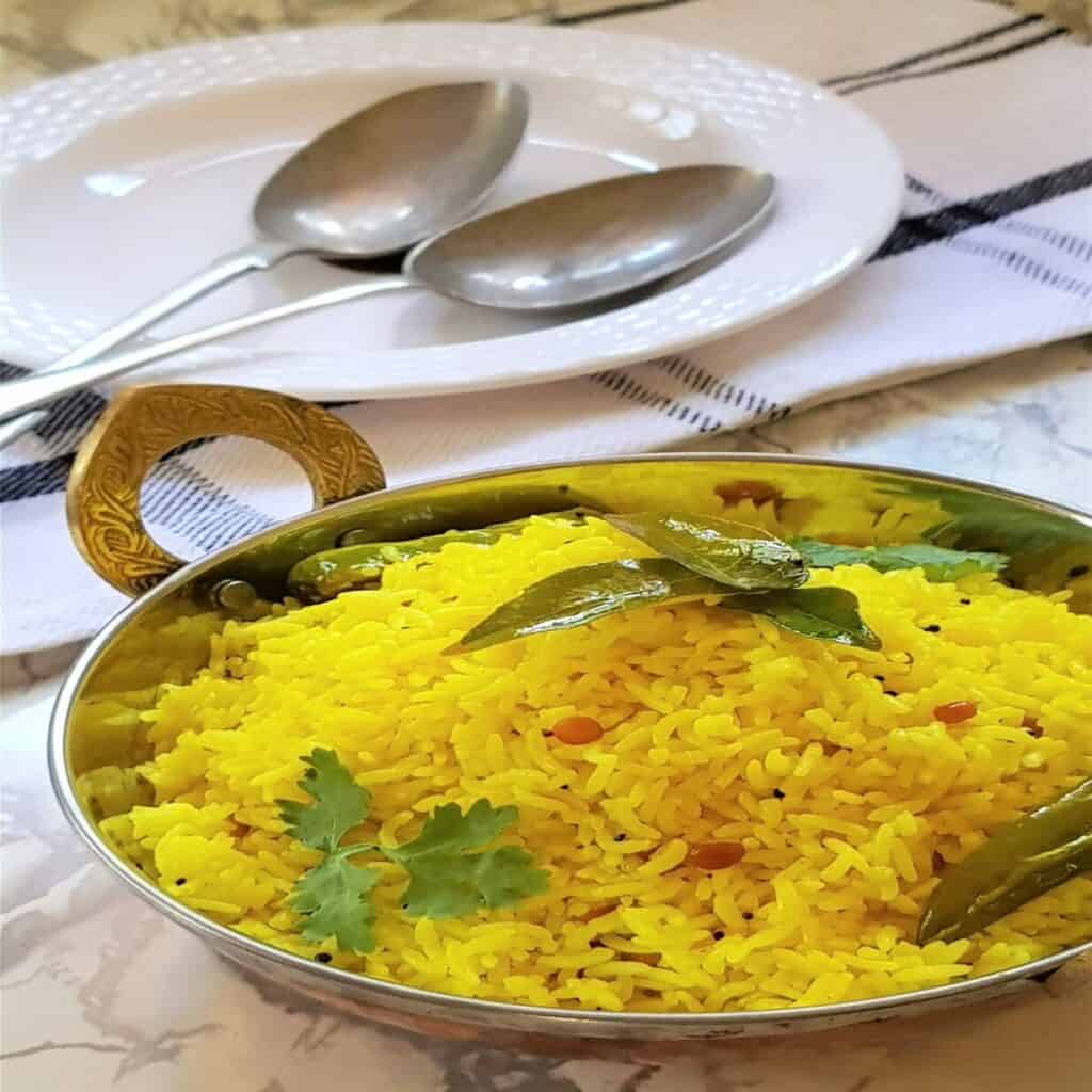lemon rice served in a serving bowl