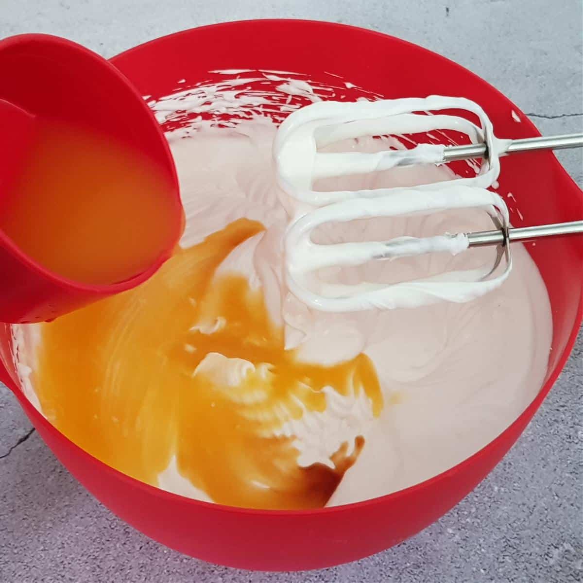 Fresh orange juice added to the ice cream mixture.