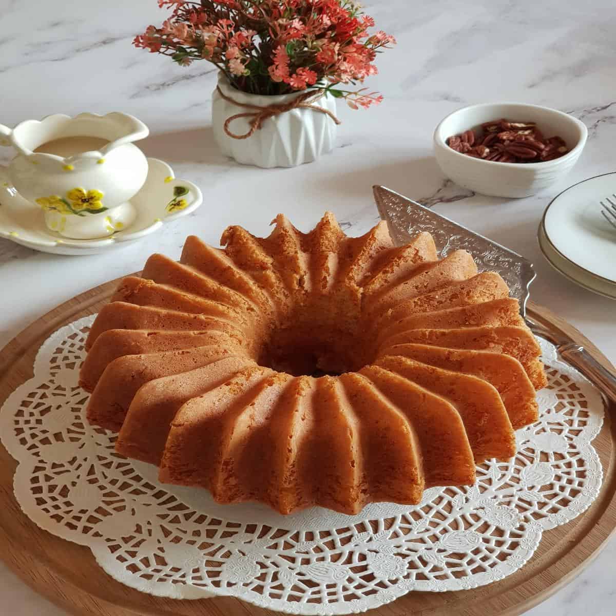 Banana cake removed from the Bundt pan and cooling.